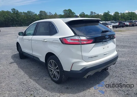 2022 Ford Edge Titanium z USA, uszkodzony, nr VIN 2FMPK4K90NBA13263